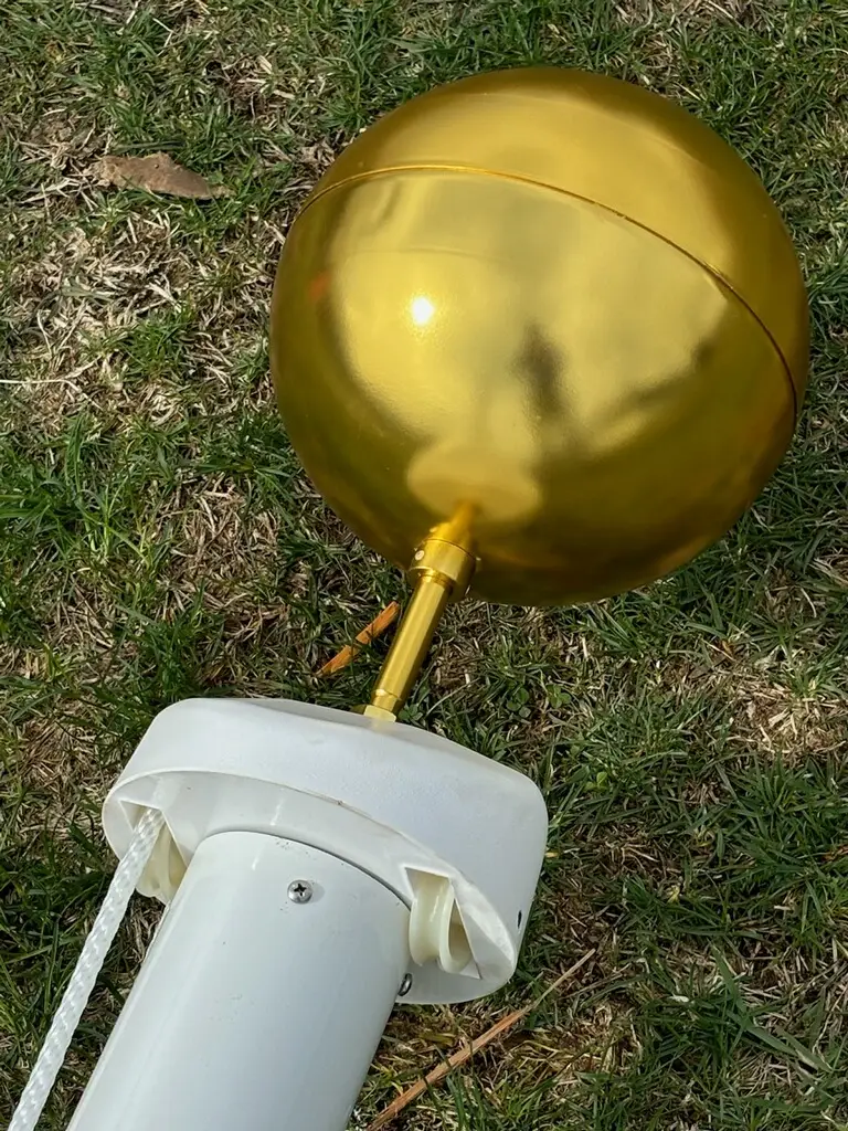 Ball topper on top of flagpole